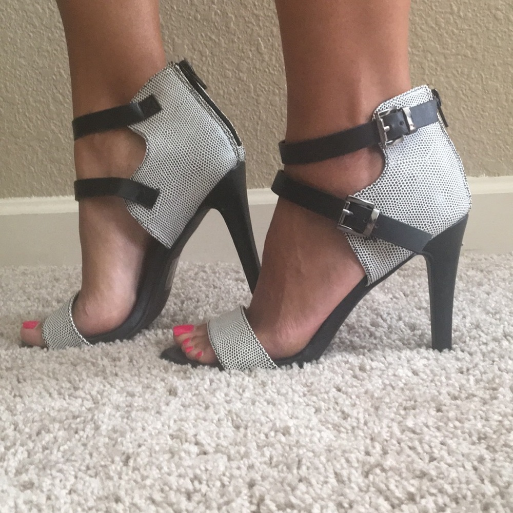 Black and white high heeled sandals